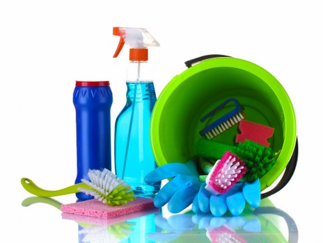Professional carpet cleaner in Wimbledon deep cleaning a living room carpet