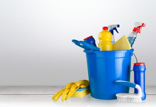 Carpet cleaner treating stains in a busy Wimbledon hallway