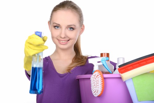 Technician checking carpet cleaning equipment before use